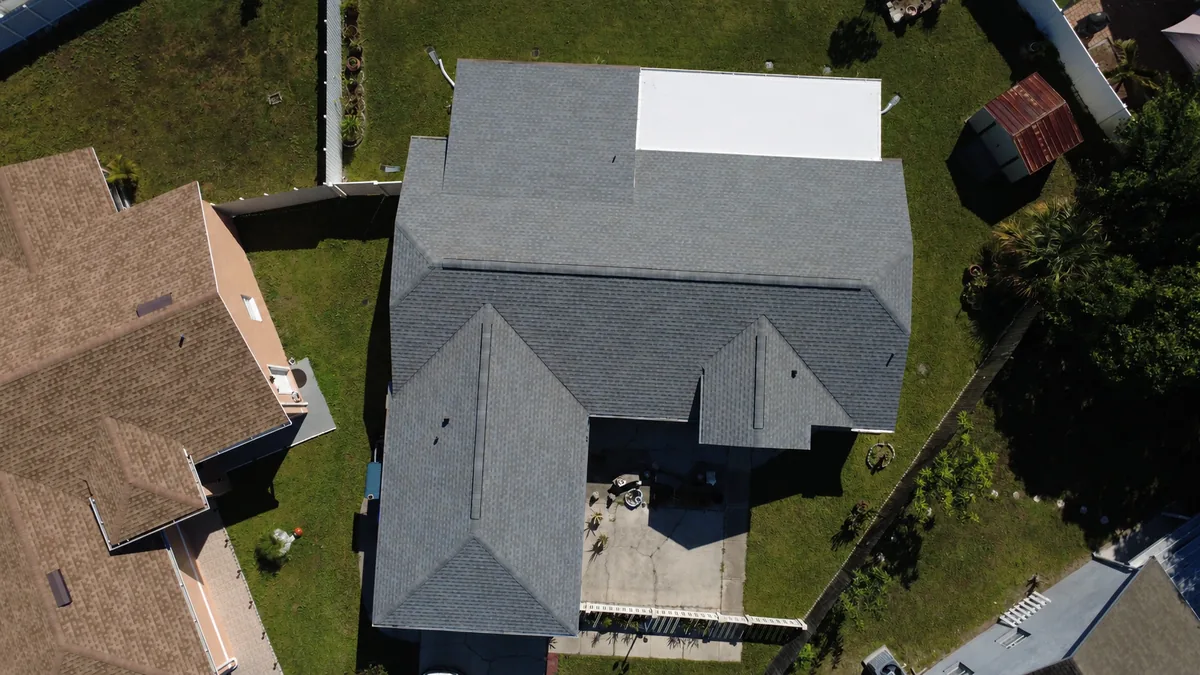 Topline Roofing professional installing premium GAF roofing materials Orlando